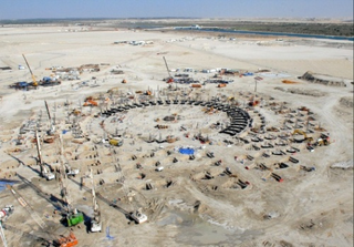 Illustration for article titled Time-Lapse Gallery Of Abu Dhabi's Nearly-Completed Ferrari World Theme Park
